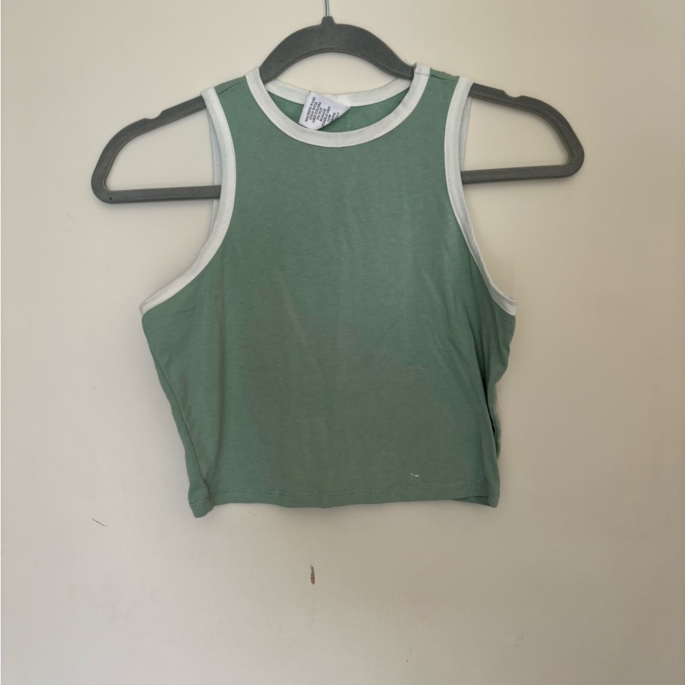 Cute minty green top with white trim. Tillys.